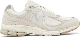 New Balance: Бежевые кроссовки  2002R