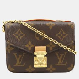 Louis Vuitton: Коричневая сумка 