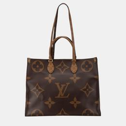 Louis Vuitton: Коричневая сумка-шоппер 