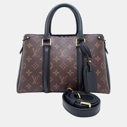 Louis Vuitton: Коричневая сумка 