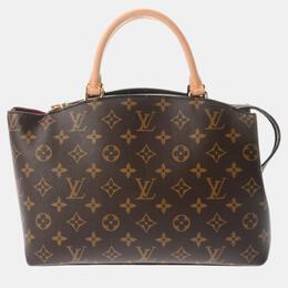 Louis Vuitton: Коричневая сумка 