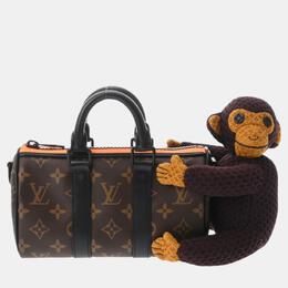 Louis Vuitton: Коричневая сумка  Keepall