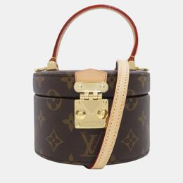 Louis Vuitton: Коричневая сумка 