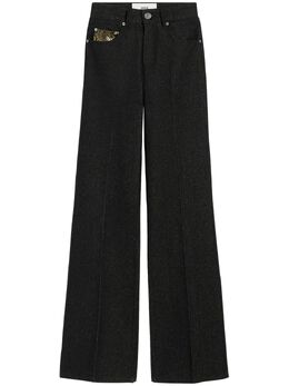 AMI Paris: Расклешённые джинсы 