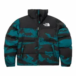 The North Face: Синий пуховик 