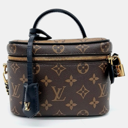 Louis Vuitton: Коричневая сумка 