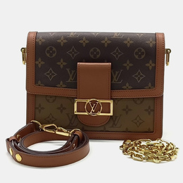 Louis Vuitton: Коричневая сумка 