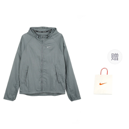 Nike: Серая куртка  Sportswear Essentials