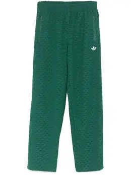 adidas: Зелёные брюки 