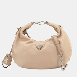 Prada: Бежевая сумка 