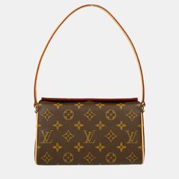 Louis Vuitton: Коричневая сумка 