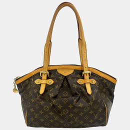 Louis Vuitton: Коричневая сумка 