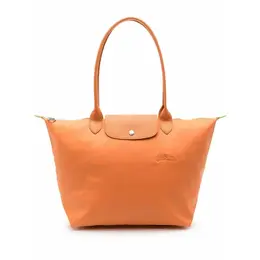 Longchamp: Оранжевая сумка 