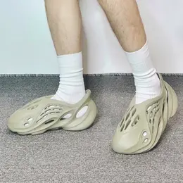 adidas: Жёлтые сабо  Yeezy Foam Runner