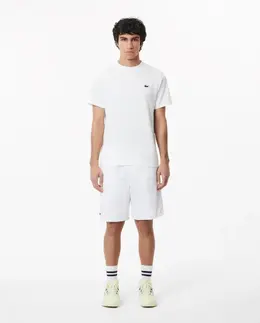 Lacoste: Короткие брюки  Sport