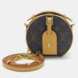 Louis Vuitton: Коричневая сумка 