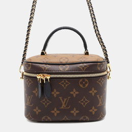 Louis Vuitton: Коричневая сумка 