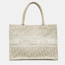 Dior: Бежевая сумка-шоппер 