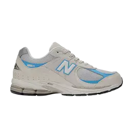 New Balance: Бежевые кроссовки  2002R