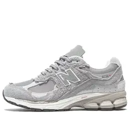 New Balance: Серые кроссовки 