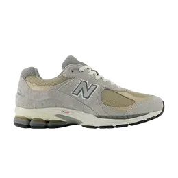 New Balance: Серые кроссовки  2002R