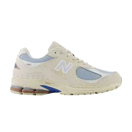 New Balance: Бежевые кроссовки  2002R