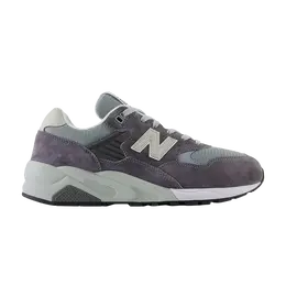 New Balance: Серые кроссовки 