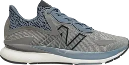 New Balance: Серые кроссовки 