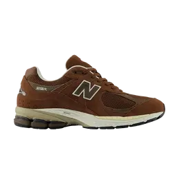 New Balance: Коричневые кроссовки  2002R