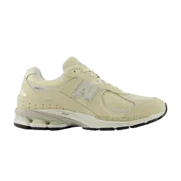New Balance: Бежевые кроссовки  2002R