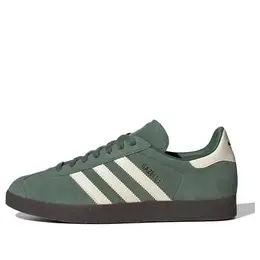 Adidas: Зелёные кроссовки  Gazelle