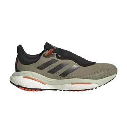 Adidas: Зелёные кроссовки  Solar