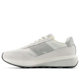 New Balance: Серые кроссовки 
