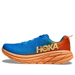 Hoka One One: Оранжевые кроссовки 