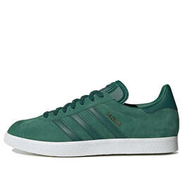 Adidas: Зелёные кроссовки  Gazelle