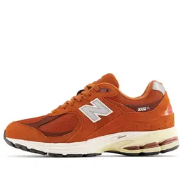 New Balance: Оранжевые кроссовки  2002R