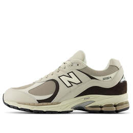 New Balance: Коричневые кроссовки  2002R