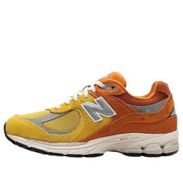 New Balance: Оранжевые кроссовки  2002R