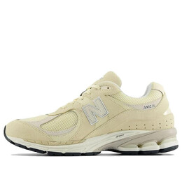 New Balance: Бежевые кроссовки  2002R