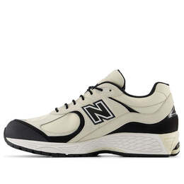 New Balance: Бежевые кроссовки  2002R