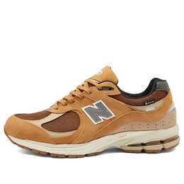 New Balance: Бежевые кроссовки  2002R