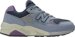 New Balance: Серые кроссовки 