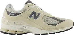 New Balance: Бежевые кроссовки  2002R