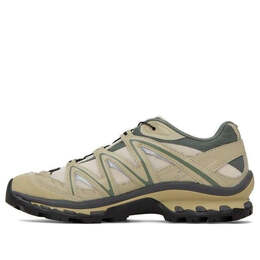 Salomon: Зелёные кроссовки 