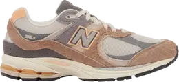 New Balance: Оранжевые кроссовки  2002R
