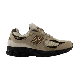 New Balance: Коричневые кроссовки  2002R