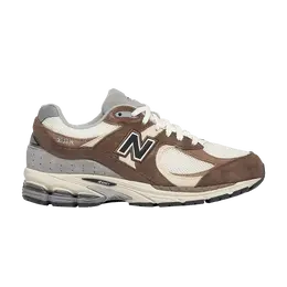 New Balance: Коричневые кроссовки  2002R