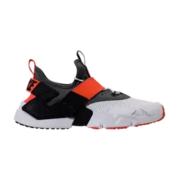 Nike: Оранжевые кроссовки  Air Huarache