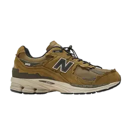 New Balance: Коричневые кроссовки  2002R
