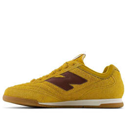 New Balance: Жёлтые кроссовки 